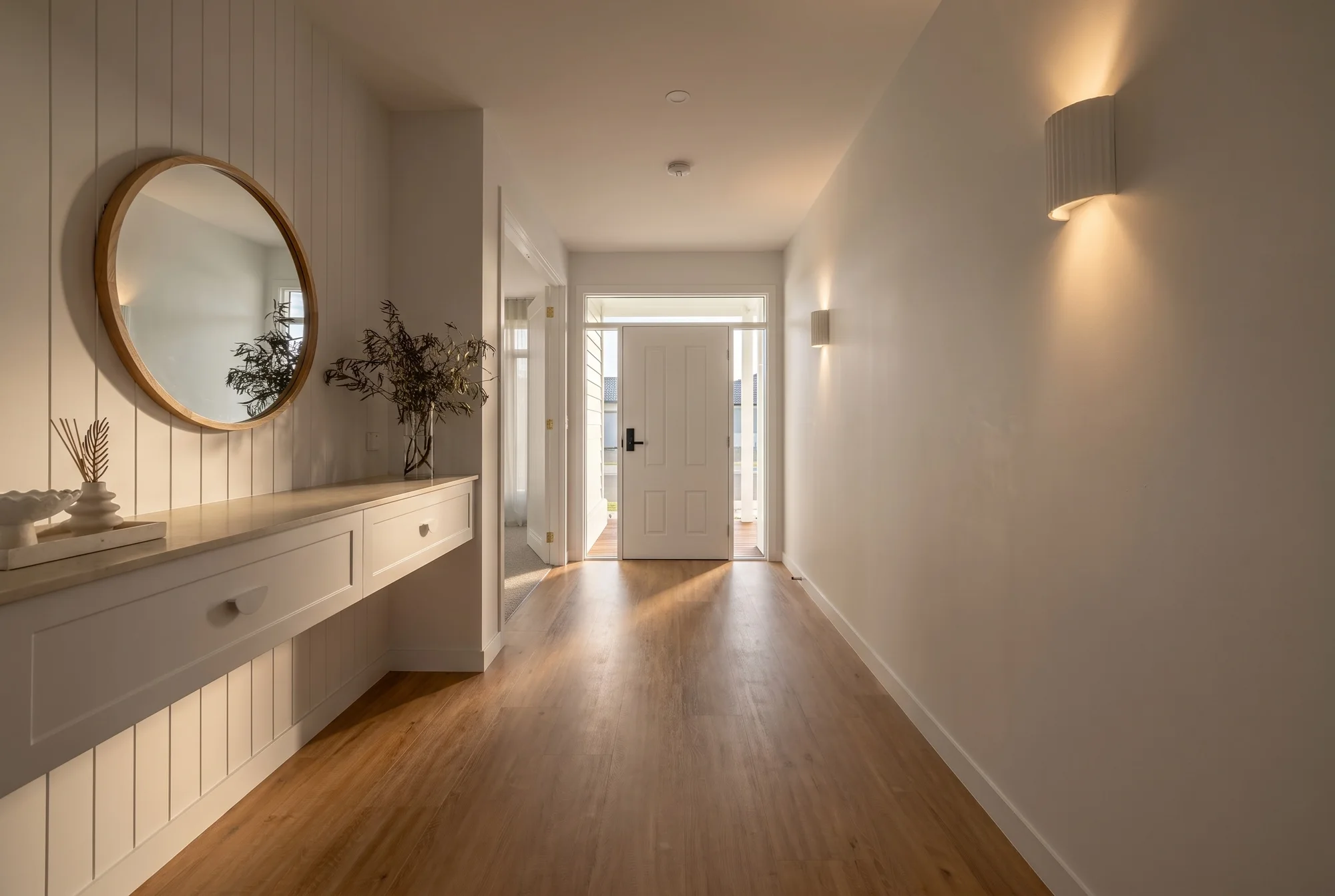 Entry hall with a built-in timber-topped bench