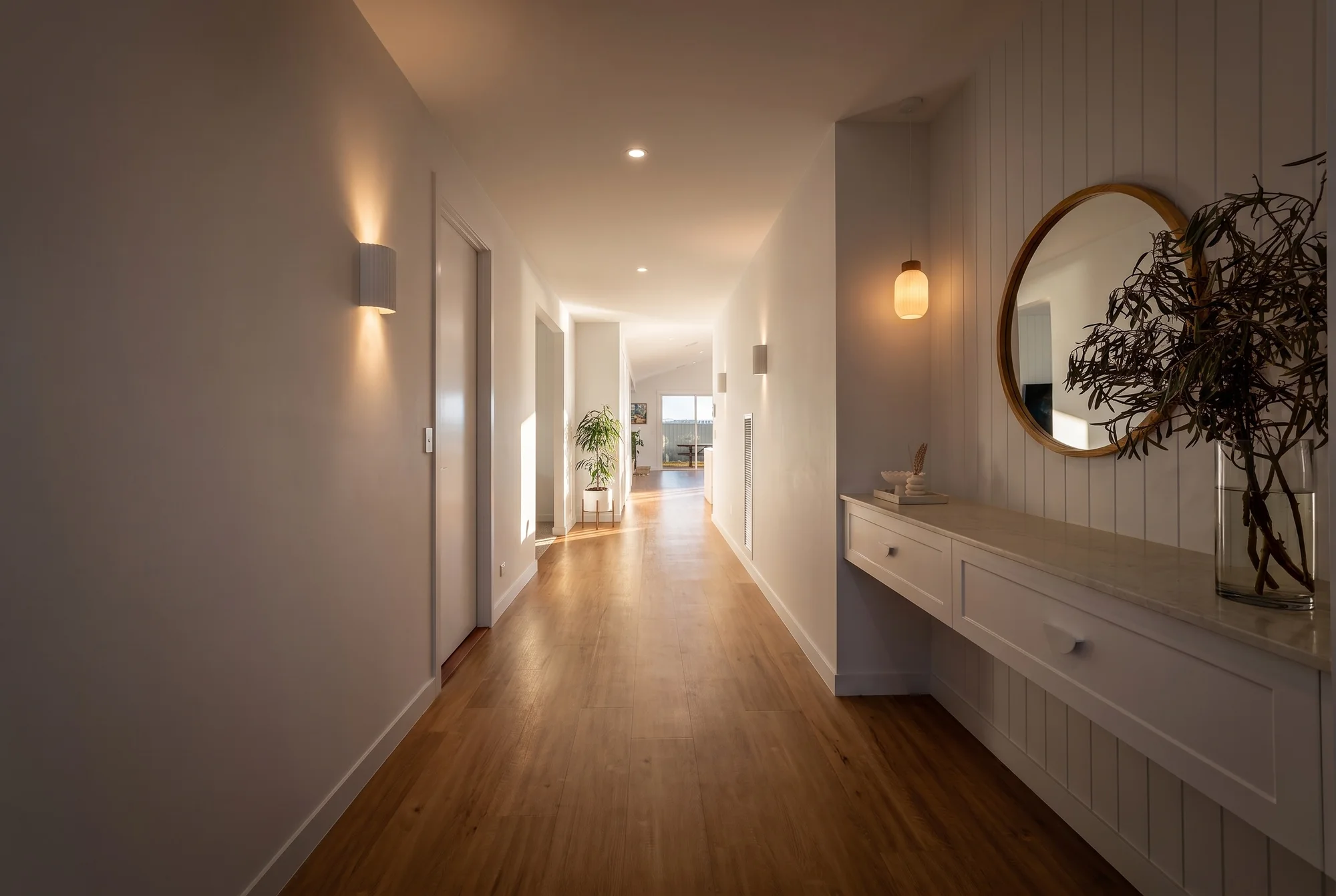 Hallway with VJ panelling and wall lights