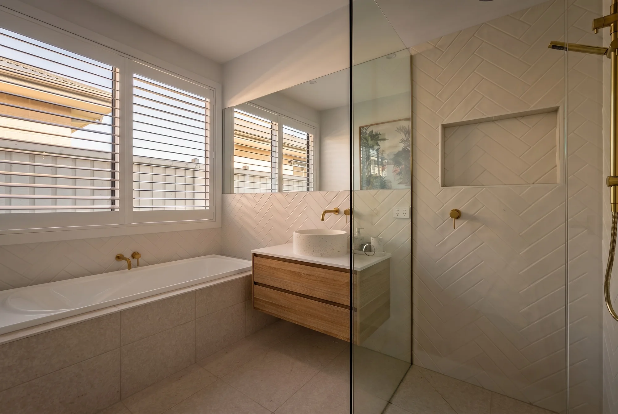 Main bathroom with a built-in bath and walk-in shower